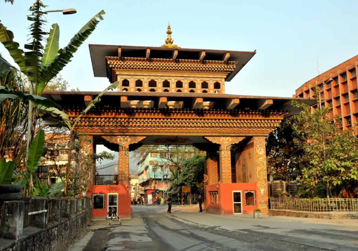 The iconic Bhutan Gate separating Jaigaon India from Phuentsholing Bhutan